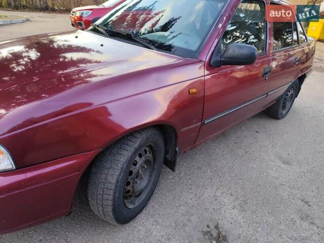 Червоний Деу Нексія, об'ємом двигуна 1.5 л та пробігом 182 тис. км за 1390 $, фото 10 на Automoto.ua
