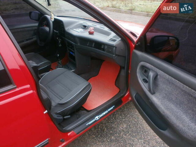 Червоний Деу Нексія, об'ємом двигуна 1.5 л та пробігом 181 тис. км за 2750 $, фото 13 на Automoto.ua