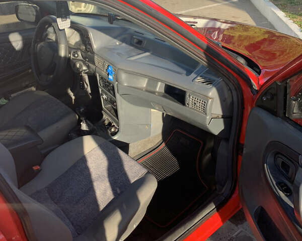 Червоний Деу Нексія, об'ємом двигуна 1.6 л та пробігом 157 тис. км за 1800 $, фото 9 на Automoto.ua
