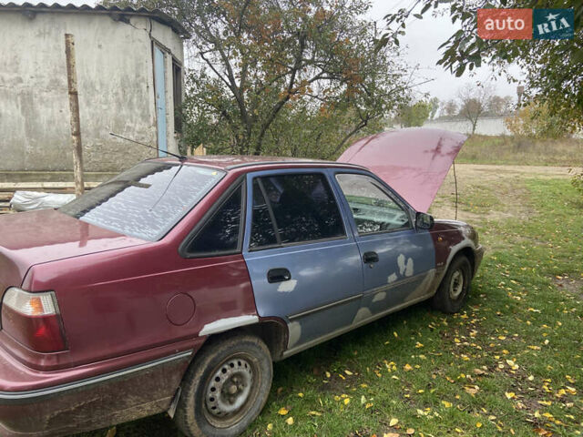 Дэу Нексия 2007 в Могилев-Подольском на Automoto.ua Красный Дэу Нексия, объемом двигателя 1.5 л и пробегом 200 тыс. км за 800 $, фото 5 на Automoto.ua
