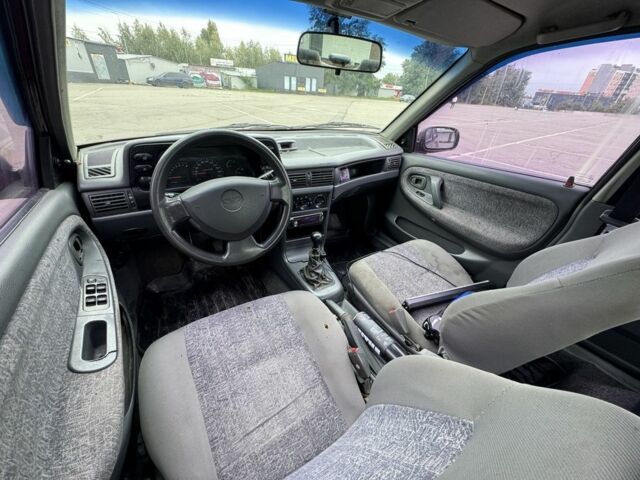 Красный Дэу Нексия, объемом двигателя 1.6 л и пробегом 230 тыс. км за 850 $, фото 6 на Automoto.ua