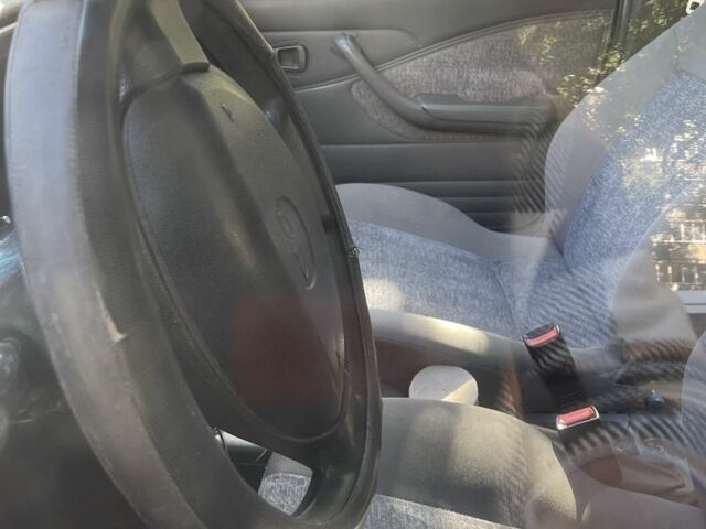 Красный Дэу Нексия, объемом двигателя 1.5 л и пробегом 280 тыс. км за 500 $, фото 4 на Automoto.ua