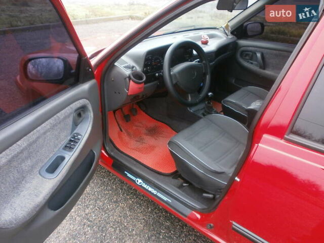 Червоний Деу Нексія, об'ємом двигуна 1.5 л та пробігом 181 тис. км за 2750 $, фото 9 на Automoto.ua