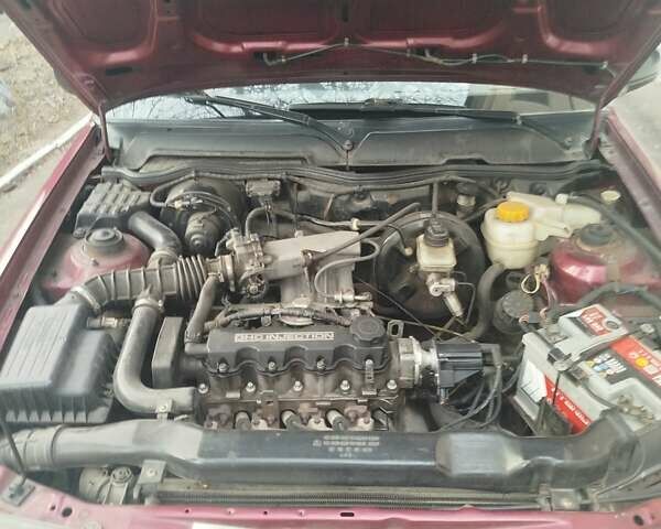 Червоний Деу Нексія, об'ємом двигуна 1.5 л та пробігом 141 тис. км за 1800 $, фото 5 на Automoto.ua