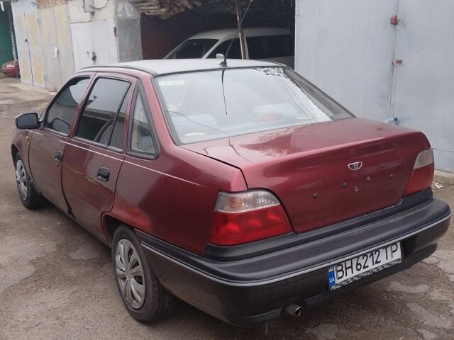 Красный Дэу Нексия, объемом двигателя 1.5 л и пробегом 200 тыс. км за 850 $, фото 4 на Automoto.ua