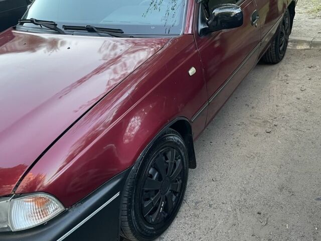 Красный Дэу Нексия, объемом двигателя 1.5 л и пробегом 153 тыс. км за 1569 $, фото 2 на Automoto.ua