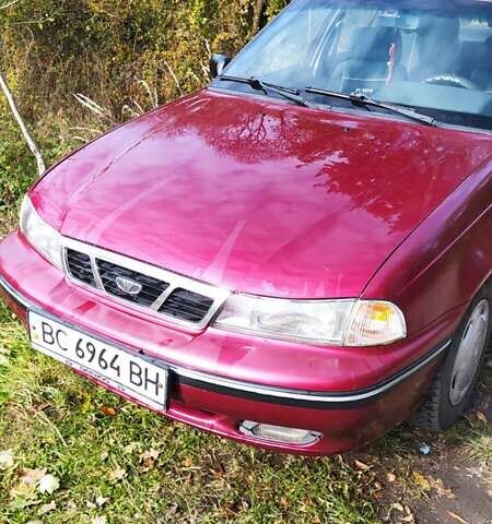 Красный Дэу Нексия, объемом двигателя 1.5 л и пробегом 208 тыс. км за 2000 $, фото 1 на Automoto.ua