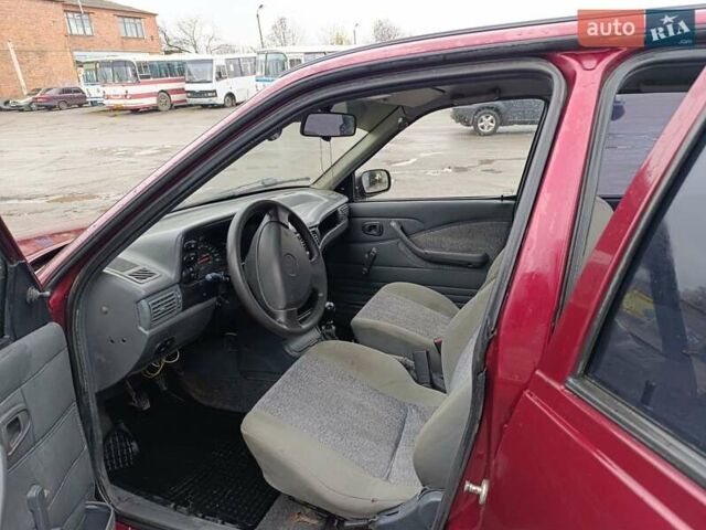 Красный Дэу Нексия, объемом двигателя 1.5 л и пробегом 290 тыс. км за 999 $, фото 10 на Automoto.ua