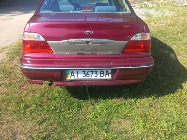 Червоний Деу Нексія, об'ємом двигуна 1.5 л та пробігом 155 тис. км за 1000 $, фото 1 на Automoto.ua