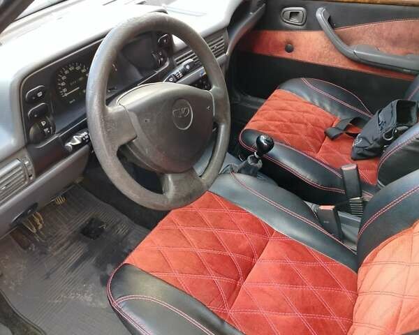Червоний Деу Нексія, об'ємом двигуна 1.5 л та пробігом 168 тис. км за 900 $, фото 8 на Automoto.ua
