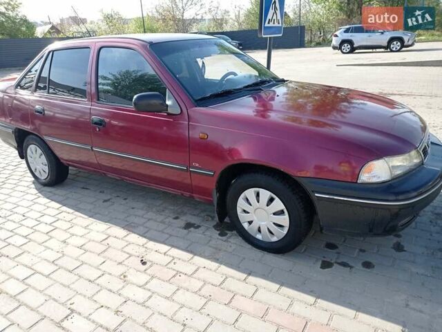 Червоний Деу Нексія, об'ємом двигуна 1.5 л та пробігом 180 тис. км за 1850 $, фото 1 на Automoto.ua