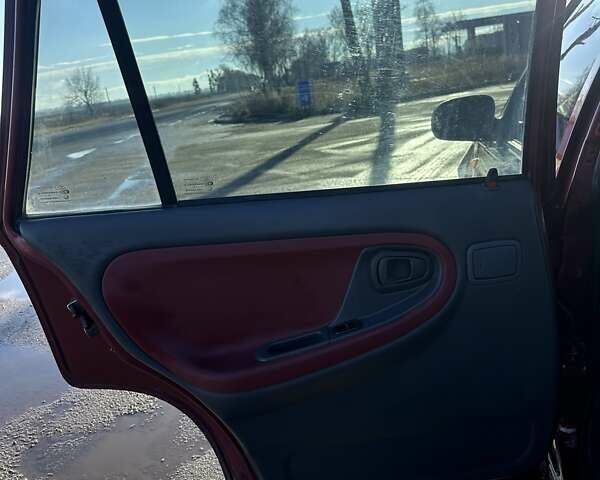 Красный Дэу Нексия, объемом двигателя 1.5 л и пробегом 262 тыс. км за 2800 $, фото 11 на Automoto.ua