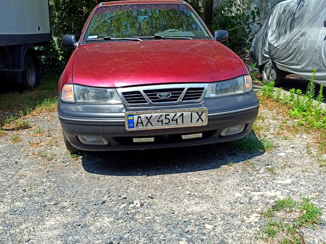Красный Дэу Нексия, объемом двигателя 1.5 л и пробегом 150 тыс. км за 1750 $, фото 2 на Automoto.ua