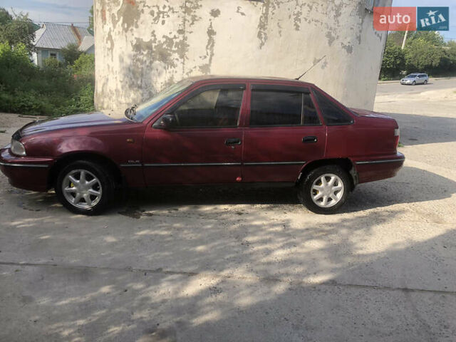 Червоний Деу Нексія, об'ємом двигуна 1.5 л та пробігом 235 тис. км за 1700 $, фото 5 на Automoto.ua