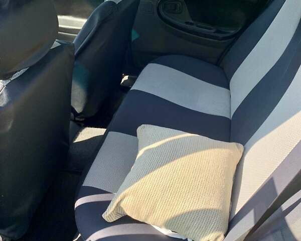 Червоний Деу Нексія, об'ємом двигуна 1.5 л та пробігом 200 тис. км за 2800 $, фото 9 на Automoto.ua
