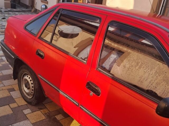 Красный Дэу Нексия, объемом двигателя 1.5 л и пробегом 165 тыс. км за 1000 $, фото 2 на Automoto.ua