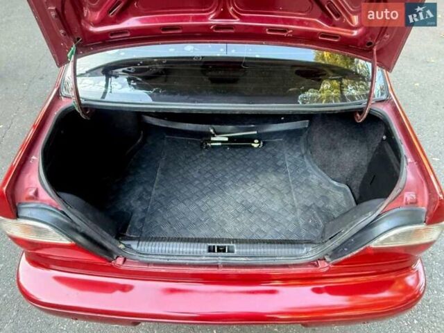 Красный Дэу Нексия, объемом двигателя 1.5 л и пробегом 230 тыс. км за 1750 $, фото 24 на Automoto.ua