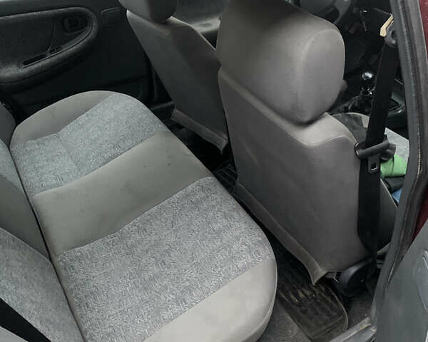 Красный Дэу Нексия, объемом двигателя 1.5 л и пробегом 240 тыс. км за 1100 $, фото 6 на Automoto.ua