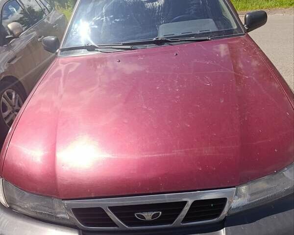 Червоний Деу Нексія, об'ємом двигуна 1.5 л та пробігом 210 тис. км за 2000 $, фото 1 на Automoto.ua