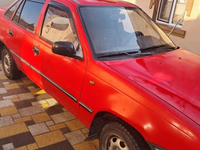 Красный Дэу Нексия, объемом двигателя 1.5 л и пробегом 165 тыс. км за 1000 $, фото 1 на Automoto.ua