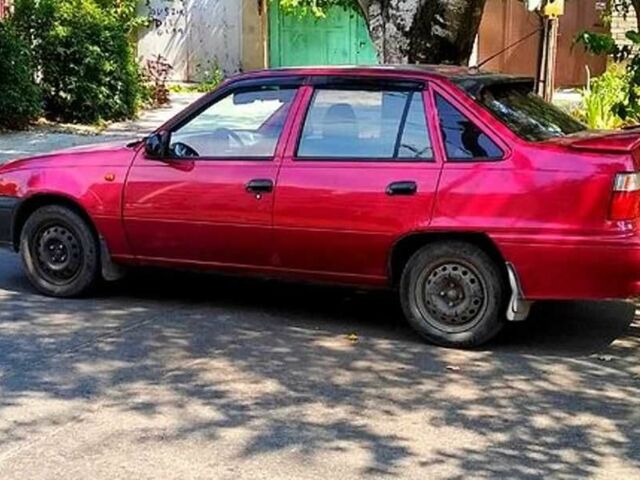 Красный Дэу Нексия, объемом двигателя 1.5 л и пробегом 152 тыс. км за 1500 $, фото 6 на Automoto.ua