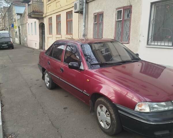Червоний Деу Нексія, об'ємом двигуна 1.5 л та пробігом 141 тис. км за 1800 $, фото 1 на Automoto.ua