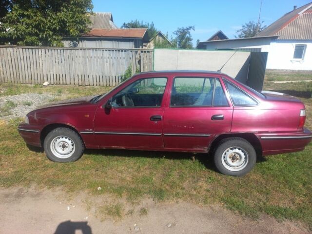 Червоний Деу Нексія, об'ємом двигуна 1.5 л та пробігом 155 тис. км за 1000 $, фото 2 на Automoto.ua