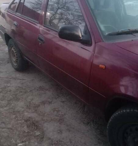 Красный Дэу Нексия, объемом двигателя 1.5 л и пробегом 504 тыс. км за 1100 $, фото 2 на Automoto.ua