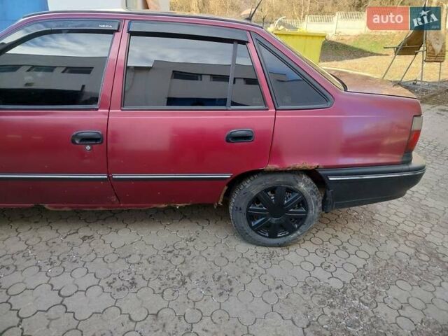 Червоний Деу Нексія, об'ємом двигуна 1.5 л та пробігом 168 тис. км за 900 $, фото 10 на Automoto.ua