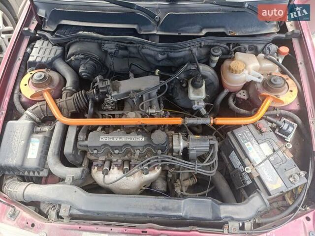 Червоний Деу Нексія, об'ємом двигуна 1.5 л та пробігом 210 тис. км за 2000 $, фото 5 на Automoto.ua