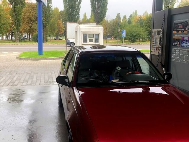 Красный Дэу Нексия, объемом двигателя 1.5 л и пробегом 280 тыс. км за 2000 $, фото 4 на Automoto.ua