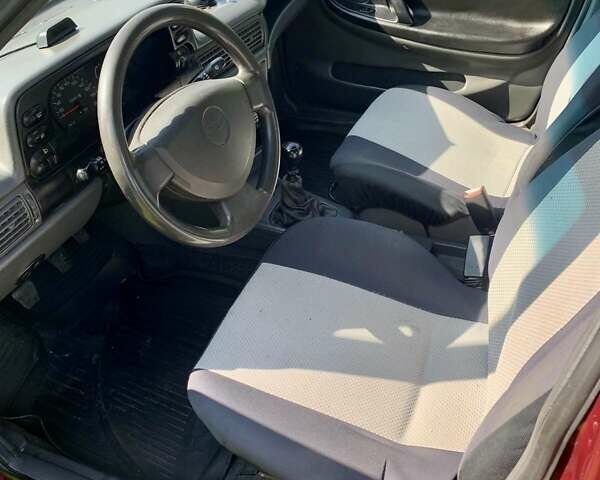 Червоний Деу Нексія, об'ємом двигуна 1.5 л та пробігом 200 тис. км за 2800 $, фото 8 на Automoto.ua