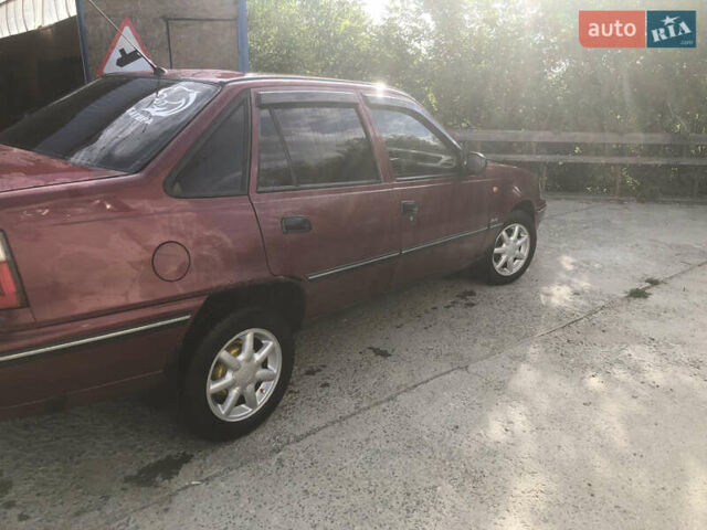 Червоний Деу Нексія, об'ємом двигуна 1.5 л та пробігом 235 тис. км за 1700 $, фото 3 на Automoto.ua