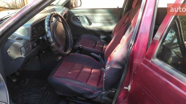 Красный Дэу Нексия, объемом двигателя 1.5 л и пробегом 356 тыс. км за 1200 $, фото 4 на Automoto.ua