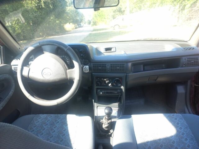 Червоний Деу Нексія, об'ємом двигуна 1.5 л та пробігом 155 тис. км за 1000 $, фото 6 на Automoto.ua