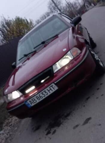 Красный Дэу Нексия, объемом двигателя 1.45 л и пробегом 270 тыс. км за 1350 $, фото 2 на Automoto.ua