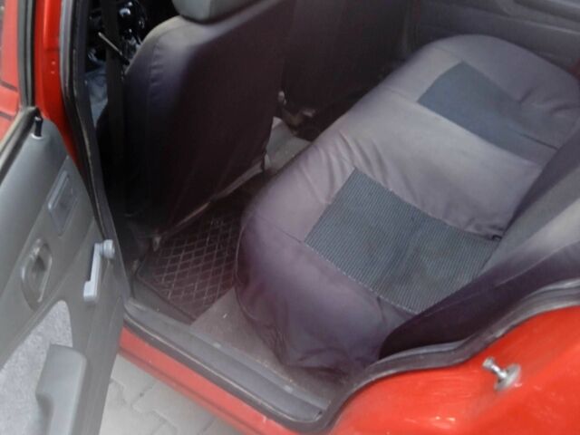 Червоний Деу Нексія, об'ємом двигуна 1.5 л та пробігом 170 тис. км за 1300 $, фото 5 на Automoto.ua