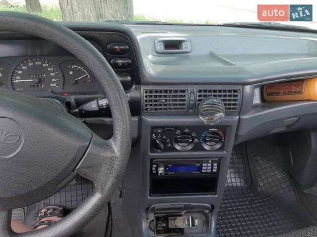 Червоний Деу Нексія, об'ємом двигуна 1.5 л та пробігом 190 тис. км за 1200 $, фото 5 на Automoto.ua