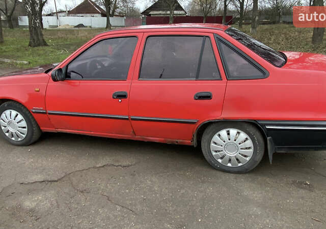 Красный Дэу Нексия, объемом двигателя 1.5 л и пробегом 375 тыс. км за 1450 $, фото 3 на Automoto.ua