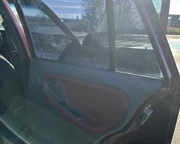 Красный Дэу Нексия, объемом двигателя 1.5 л и пробегом 262 тыс. км за 2800 $, фото 5 на Automoto.ua