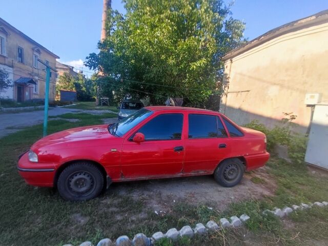 Красный Дэу Нексия, объемом двигателя 1.5 л и пробегом 265 тыс. км за 1500 $, фото 3 на Automoto.ua