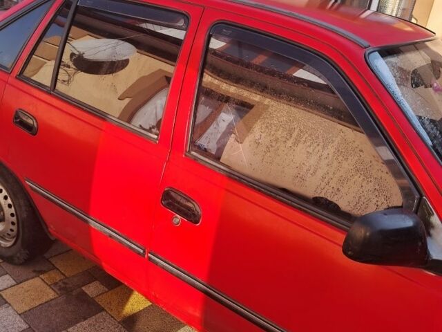 Красный Дэу Нексия, объемом двигателя 1.5 л и пробегом 165 тыс. км за 1000 $, фото 3 на Automoto.ua