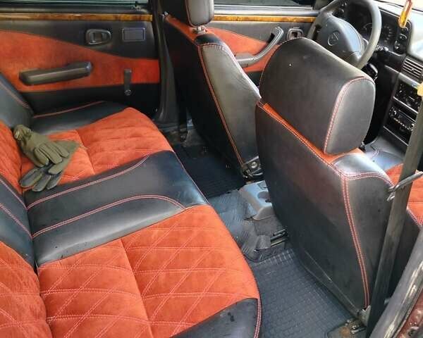 Червоний Деу Нексія, об'ємом двигуна 1.5 л та пробігом 168 тис. км за 900 $, фото 5 на Automoto.ua