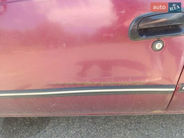 Червоний Деу Нексія, об'ємом двигуна 1.5 л та пробігом 210 тис. км за 2000 $, фото 7 на Automoto.ua