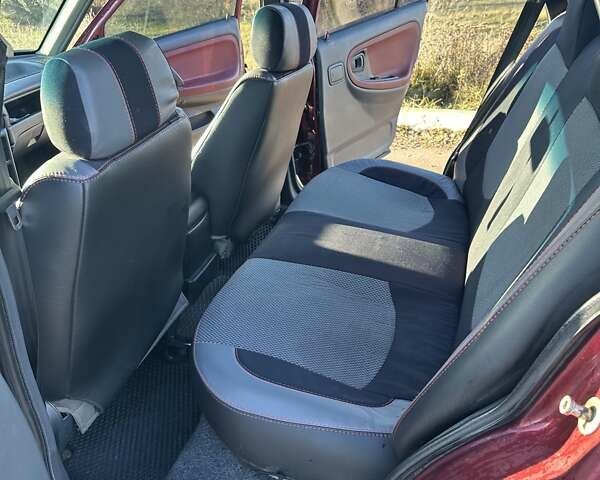 Красный Дэу Нексия, объемом двигателя 1.5 л и пробегом 262 тыс. км за 2800 $, фото 7 на Automoto.ua