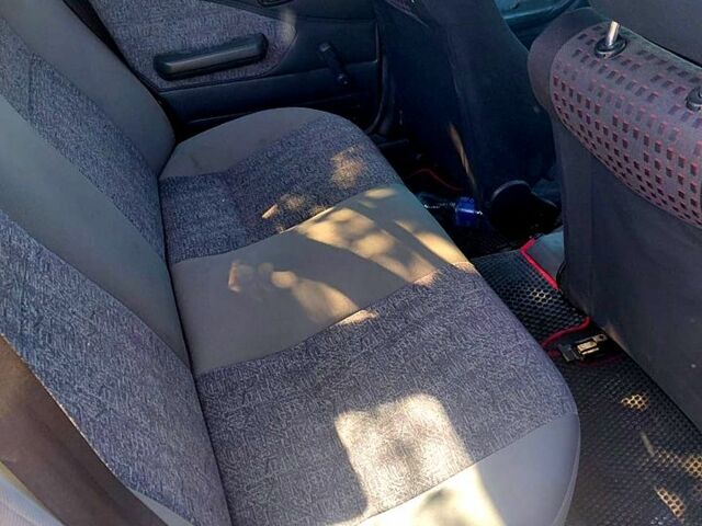 Красный Дэу Нексия, объемом двигателя 1.5 л и пробегом 190 тыс. км за 1600 $, фото 4 на Automoto.ua