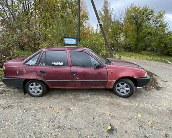 Деу Нексія 2007 у Києві на Automoto.ua Червоний Деу Нексія, об'ємом двигуна 1.6 л та пробігом 30 тис. км за 800 $, фото 2 на Automoto.ua