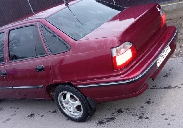 Червоний Деу Нексія, об'ємом двигуна 1.5 л та пробігом 270 тис. км за 1350 $, фото 6 на Automoto.ua