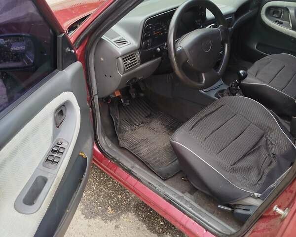 Червоний Деу Нексія, об'ємом двигуна 1.5 л та пробігом 364 тис. км за 1750 $, фото 8 на Automoto.ua