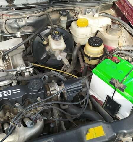 Красный Дэу Нексия, объемом двигателя 1.5 л и пробегом 208 тыс. км за 2000 $, фото 6 на Automoto.ua